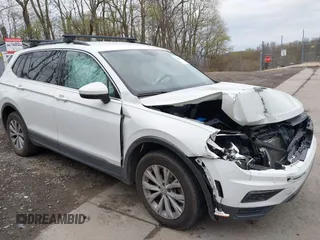 2018 Volkswagen Tiguan SEL z VIN 3VV2B7AXXJM148230, wystawiony jako IAAI lot #42081190 z przebiegiem 99 190 mil mil oraz . Historia ofert i sprzedaży dostępna na DreamBid. Obrazek 1.