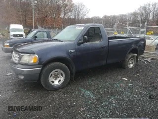 2000 Ford F-150 XL with VIN 1FTZF1829YNB04020, listed as a Copart auction lot 80888564 with Not provided miles and Salvage title. Bid and sale history available at DreamBid. Image 1.