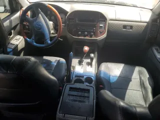 2005 Mitsubishi Montero Limited z VIN JA4MW51S65J000884, wystawiony jako Copart lot #65088034 z przebiegiem Nie podano mil oraz Szkody całkowita. Historia ofert i sprzedaży dostępna na DreamBid. Obrazek 8.