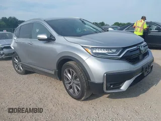2020 Honda CR-V Touring with VIN 2HKRW2H90LH617667, listed as a IAAI auction lot 42678189 with 25,267 mi miles and . Bid and sale history available at DreamBid. Image 1.