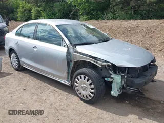 2014 Volkswagen Jetta SE z VIN 3VWD17AJXEM295138, wystawiony jako IAAI lot #42265555 z przebiegiem 123 464 mil mil oraz . Historia ofert i sprzedaży dostępna na DreamBid. Obrazek 1.