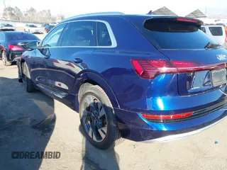 2021 Audi e-tron Premium with VIN WA1AAAGE4MB014383, listed as a IAAI auction lot 41298787 with 63,214 mi miles. Bid and sale history available at carsss.com. Image 3.
