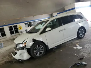 2015 Honda Odyssey Touring Elite с VIN 5FNRL5H90FB095927, выставлен на аукционе Copart как лот 56929355 с пробегом 120 711 миль миль и Списание • Salvage title. История ставок и продаж доступна на DreamBid. Изображение 1.