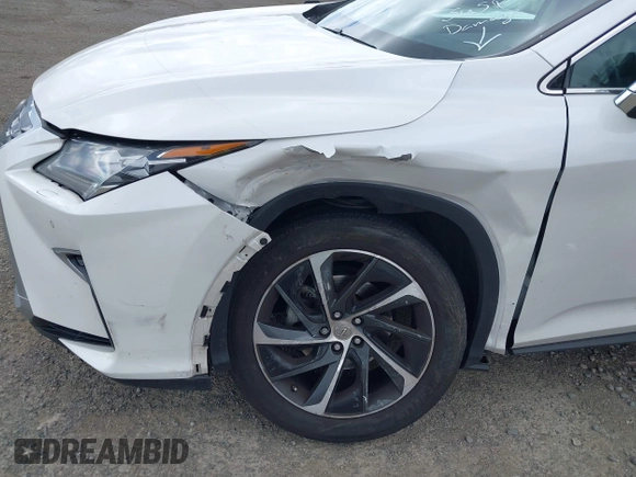 2016 Lexus RX 350 with VIN 2T2ZZMCA1GC009908, listed as a IAAI auction lot 42314574 with 126,956 mi miles and . Bid and sale history available at DreamBid. Image 6.