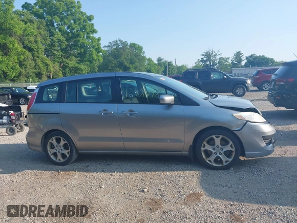 2010 Mazda 5 Sport with VIN JM1CR2W32A0385045, listed as a IAAI auction lot 42451448 with 127,762 mi miles and . Bid and sale history available at DreamBid. Image 14.