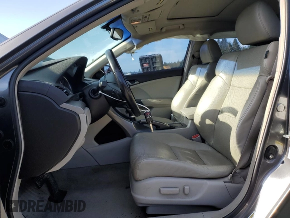 2009 Acura TSX with VIN JH4CU266X9C030464, listed as a Copart auction lot 60523455 with 161,126 mi miles and Salvage title. Bid and sale history available at DreamBid. Image 7.