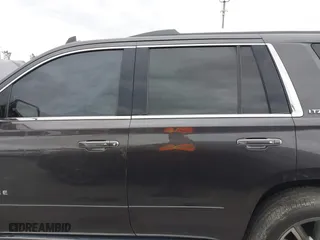 2015 Chevrolet Tahoe LTZ with VIN 1GNSCCKC7FR614886, listed as a IAAI auction lot 41679585 with 104,695 mi miles. Bid and sale history available at carsss.com. Image 14.
