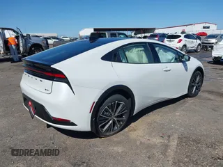 2024 Toyota Prius LE with VIN JTDACAAU6R3043434, listed as a IAAI auction lot 41757074 with 422 mi miles and . Bid and sale history available at DreamBid. Image 4.