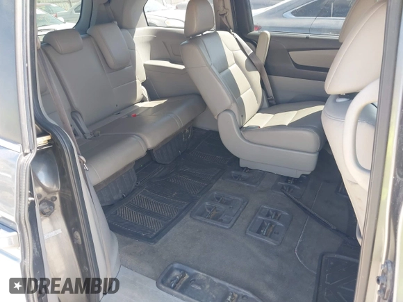 2012 Honda Odyssey EX-L with VIN 5FNRL5H69CB047425, listed as a IAAI auction lot 42064979 with 242,409 mi miles and . Bid and sale history available at carsss.com. Image 8.