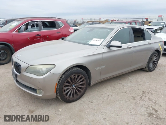2012 BMW 7 Series 740i with VIN WBAKA4C51CC613670, listed as a IAAI auction lot 41582639 with 149,753 mi miles. Bid and sale history available at carsss.com. Image 2.