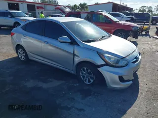 2013 Hyundai Accent GLS with VIN KMHCT4AE4DU316131, listed as a IAAI auction lot 42026497 with 125,981 mi miles. Bid and sale history available at carsss.com. Image 1.