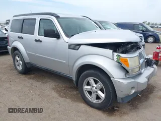 2007 Dodge Nitro SLT z VIN 1D8GT58K57W595879, wystawiony jako IAAI lot #42234088 z przebiegiem 202 216 mil mil oraz . Historia ofert i sprzedaży dostępna na DreamBid. Obrazek 1.