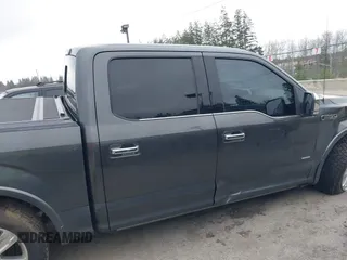2015 Ford F-150 XLT with VIN 1FTEW1EGXFFC41635, listed as a IAAI auction lot 41765722 with 128,844 mi miles. Bid and sale history available at carsss.com. Image 13.