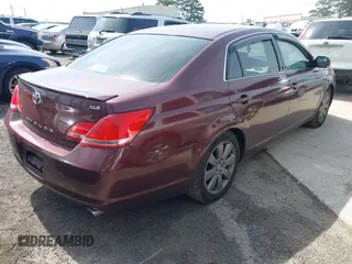 2006 Toyota Avalon XL with VIN 4T1BK36B26U067953, listed as a IAAI auction lot 41808908 with 266,175 mi miles. Bid and sale history available at carsss.com. Image 4.