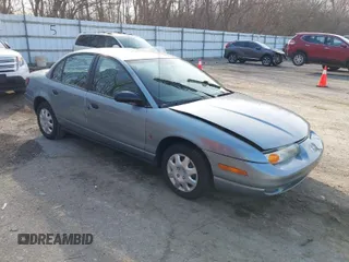 2002 Saturn SL z VIN 1G8ZH52892Z151119, wystawiony jako IAAI lot #41764757 z przebiegiem 82 017 mil mil oraz . Historia ofert i sprzedaży dostępna na DreamBid. Obrazek 1.