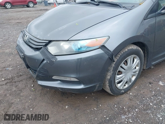 2010 Honda Insight LX with VIN JHMZE2H55AS041684, listed as a IAAI auction lot 42222564 with 296,830 mi miles and . Bid and sale history available at DreamBid. Image 14.