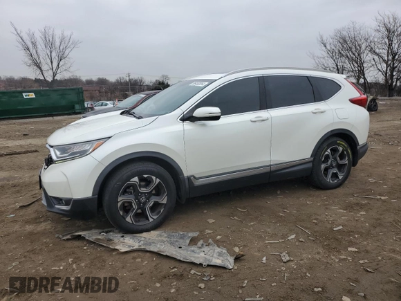 2018 Honda CR-V Touring with VIN 2HKRW2H98JH695059, listed as a Copart auction lot 86452054 with 114,437 mi miles and Salvage Title. Bid and sale history available at DreamBid. Image 1.