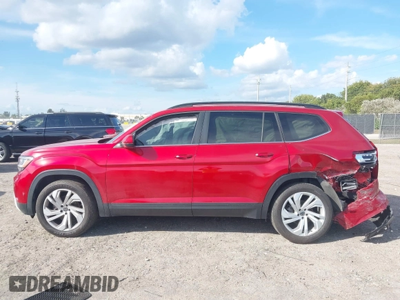 2021 Volkswagen Atlas SE z VIN 1V2WR2CA3MC526612, wystawiony jako IAAI lot #41625077 z przebiegiem 70 856 mil mil oraz . Historia ofert i sprzedaży dostępna na DreamBid. Obrazek 14.