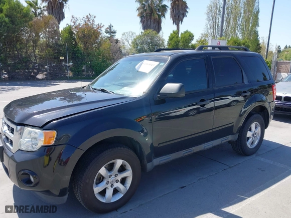 2012 Ford Escape XLT with VIN 1FMCU0D71CKC10734, listed as a IAAI auction lot 42065049 with 207,698 mi miles. Bid and sale history available at carsss.com. Image 6.