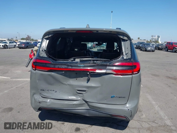 2021 Chrysler Pacifica Hybrid Limited z VIN 2C4RC1S76MR544495, wystawiony jako IAAI lot #42294312 z przebiegiem 89 083 mil mil oraz . Historia ofert i sprzedaży dostępna na DreamBid. Obrazek 16.