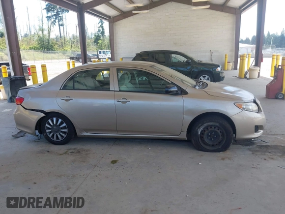 2009 Toyota Corolla with VIN 1NXBU40E79Z049147, listed as a IAAI auction lot 42654211 with 144,504 mi miles and . Bid and sale history available at DreamBid. Image 13.