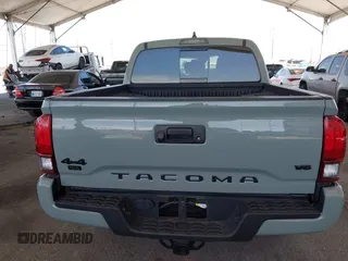 2022 Toyota Tacoma SR with VIN 3TMCZ5ANXNM479025, listed as a IAAI auction lot 42280363 with 29,650 mi miles and . Bid and sale history available at DreamBid. Image 16.
