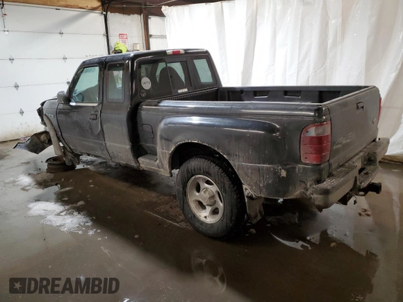 2002 Ford Ranger with VIN 1FTZR15U52PA08409, listed as a Copart auction lot 87858015 with 128,892 mi miles and Salvage Title. Bid and sale history available at DreamBid. Image 2.