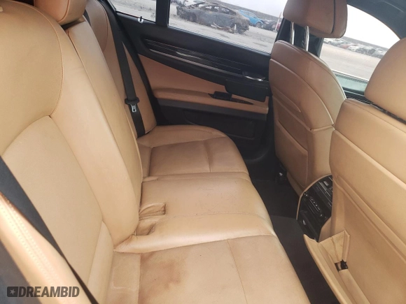 2011 BMW 7 Series 750i with VIN WBAKA8C5XBCY37073, listed as a Copart auction lot 76238914 with 129,493 mi miles and Clean Title. Bid and sale history available at carsss.com. Image 10.