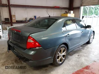 2012 Ford Fusion SE z VIN 3FAHP0HA8CR298495, wystawiony jako IAAI lot #42245859 z przebiegiem 192 979 mil mil oraz . Historia ofert i sprzedaży dostępna na DreamBid. Obrazek 4.