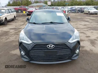 2013 Hyundai Veloster Turbo z VIN KMHTC6AE5DU151346, wystawiony jako IAAI lot #41177509 z przebiegiem 112 955 mil mil oraz . Historia ofert i sprzedaży dostępna na DreamBid. Obrazek 13.