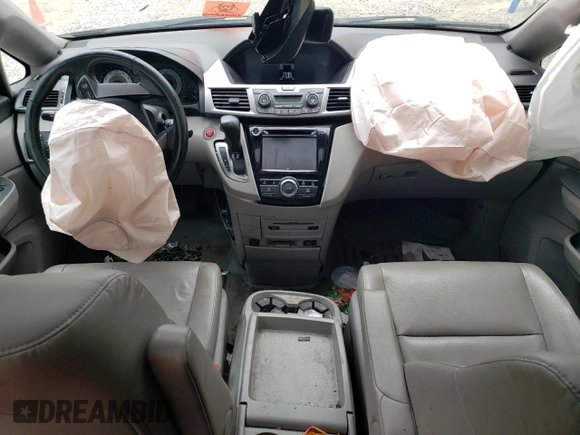 2014 Honda Odyssey EX-L with VIN 5FNRL5H69EB125480, listed as a Copart auction lot 59988475 with Not provided miles and Salvage title. Bid and sale history available at DreamBid. Image 8.