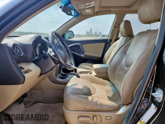 2010 Toyota RAV4 Limited with VIN JTMYF4DV6A5031711, listed as a Copart auction lot 58504215 with 171,428 mi miles and Salvage title. Bid and sale history available at DreamBid. Image 7.