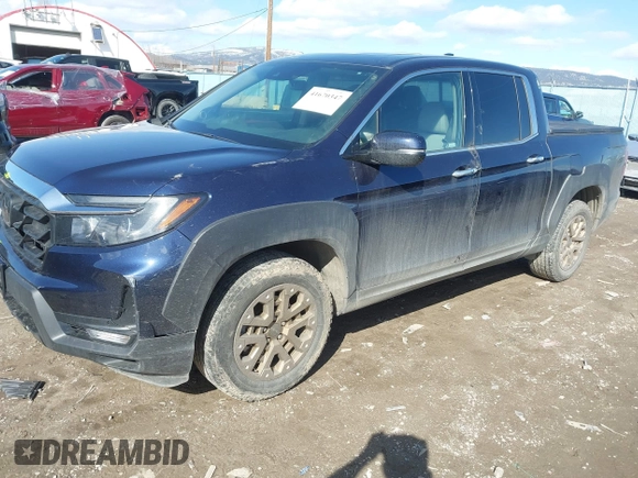 2022 Honda Ridgeline RTL-E with VIN 5FPYK3F71NB013522, listed as a IAAI auction lot 41670347 with 24,689 mi miles and . Bid and sale history available at DreamBid. Image 2.