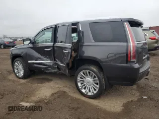 2017 Cadillac Escalade Platinum z VIN 1GYS4DKJ5HR186324, wystawiony jako Copart lot #53880955 z przebiegiem 97 166 mil mil oraz Szkoda całkowita • Salvage title. Historia ofert i sprzedaży dostępna na DreamBid. Obrazek 2.