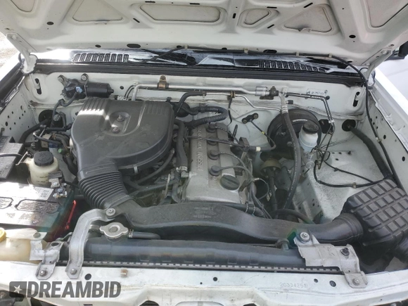 2002 Nissan Frontier XE with VIN 1N6DD26S42C334251, listed as a Copart auction lot 49308145 with 202,805 mi miles and Salvage title. Bid and sale history available at DreamBid. Image 11.