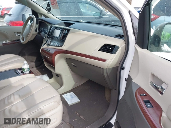 2012 Toyota Sienna XLE with VIN 5TDDK3DC3CS046182, listed as a IAAI auction lot 41387074 with 161,348 mi miles. Bid and sale history available at carsss.com. Image 5.