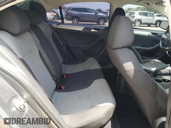 2017 Volkswagen Jetta S z VIN 3VW2B7AJXHM313582, wystawiony jako Copart lot #61959775 z przebiegiem 60 831 mil mil oraz Czysty tytuł • Clean title. Historia ofert i sprzedaży dostępna na DreamBid. Obrazek 10.