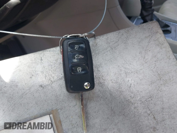 2014 Volkswagen Passat S with VIN 1VWAP7A30EC025369, listed as a IAAI auction lot 42525534 with 169,000 mi miles and . Bid and sale history available at DreamBid. Image 11.