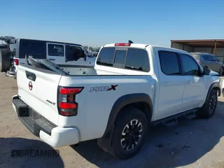 2022 Nissan Frontier SV with VIN 1N6ED1EJ2NN685935, listed as a IAAI auction lot 41859677 with 33,153 mi miles and . Bid and sale history available at DreamBid. Image 4.