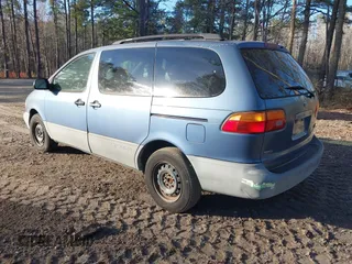 2000 Toyota Sienna LE with VIN 4T3ZF13C5YU181671, listed as a IAAI auction lot 41733892 with 212,013 mi miles. Bid and sale history available at carsss.com. Image 3.