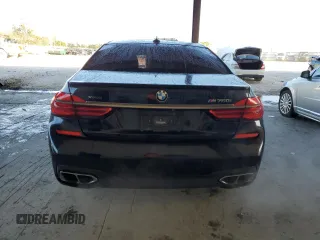 2019 BMW 7 Series M760i xDrive with VIN WBA7H6C55KG614986, listed as a Copart auction lot 84023164 with 59,222 mi miles and Non Repairable. Bid and sale history available at carsss.com. Image 6.