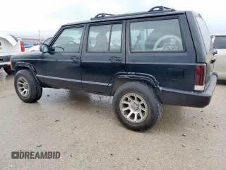 2001 Jeep Cherokee Sport with VIN 1J4FT48S41L535289, listed as a Copart auction lot 54053275 with 227,640 mi miles and Clean Title. Bid and sale history available at carsss.com. Image 3.