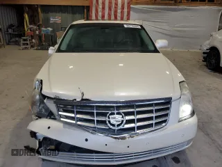 2009 Cadillac DTS 1SC z VIN 1G6KD57Y59U118737, wystawiony jako Copart lot #80776524 z przebiegiem 123 001 mil mil oraz Szkoda całkowita • Salvage title. Historia ofert i sprzedaży dostępna na DreamBid. Obrazek 5.