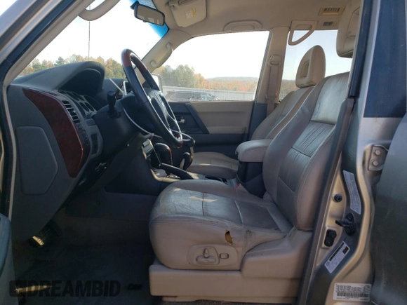 2005 Mitsubishi Montero Limited z VIN JA4MW51S65J000349, wystawiony jako Copart lot #77456554 z przebiegiem 173 334 mil mil oraz Szkoda całkowita • Salvage title. Historia ofert i sprzedaży dostępna na DreamBid. Obrazek 7.