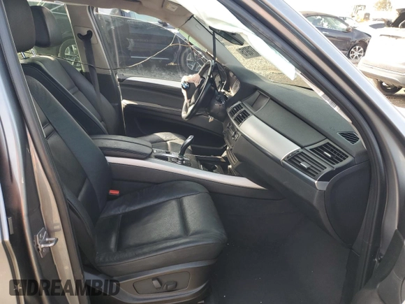 2012 BMW X5 35i with VIN 5UXZV4C51CL764495, listed as a Copart auction lot 48718915 with Not provided miles and Salvage title. Bid and sale history available at DreamBid. Image 7.