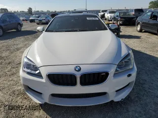 2014 BMW M6 z VIN WBSLX9C51ED160143, wystawiony jako Copart lot #50762185 z przebiegiem 91 718 mil mil oraz Szkody całkowita. Historia ofert i sprzedaży dostępna na DreamBid. Obrazek 5.