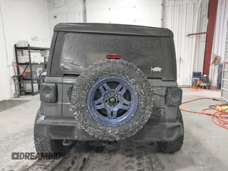 2020 Jeep Wrangler Unlimited Sport Altitude with VIN 1C4HJXDG7LW167909, listed as a IAAI auction lot 41413004 with 69,631 mi miles and . Bid and sale history available at DreamBid. Image 16.