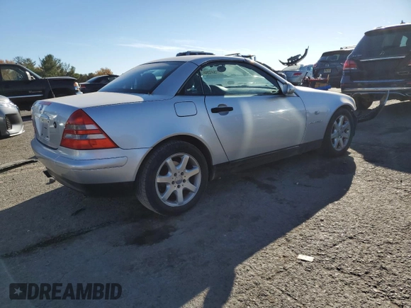 2000 Mercedes-Benz SLK-Class Kompressor with VIN WDBKK47F2YF150980, listed as a Copart auction lot 77537264 with 82,206 mi miles and Salvage Title. Bid and sale history available at carsss.com. Image 3.