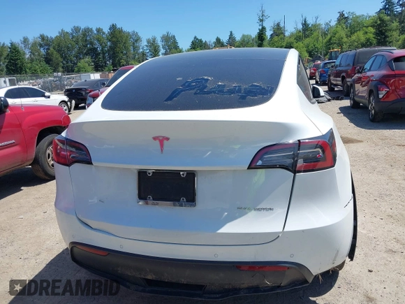 2022 Tesla Model Y Long Range z VIN 7SAYGDEE9NF509655, wystawiony jako IAAI lot #42433796 z przebiegiem 46 936 mil mil oraz . Historia ofert i sprzedaży dostępna na DreamBid. Obrazek 16.