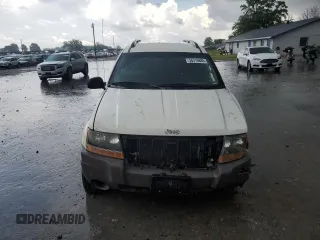 2004 Jeep Grand Cherokee Laredo z VIN 1J4GW48S74C165732, wystawiony jako Copart lot #56316885 z przebiegiem 177 139 mil mil oraz Szkoda całkowita • Salvage title. Historia ofert i sprzedaży dostępna na DreamBid. Obrazek 5.